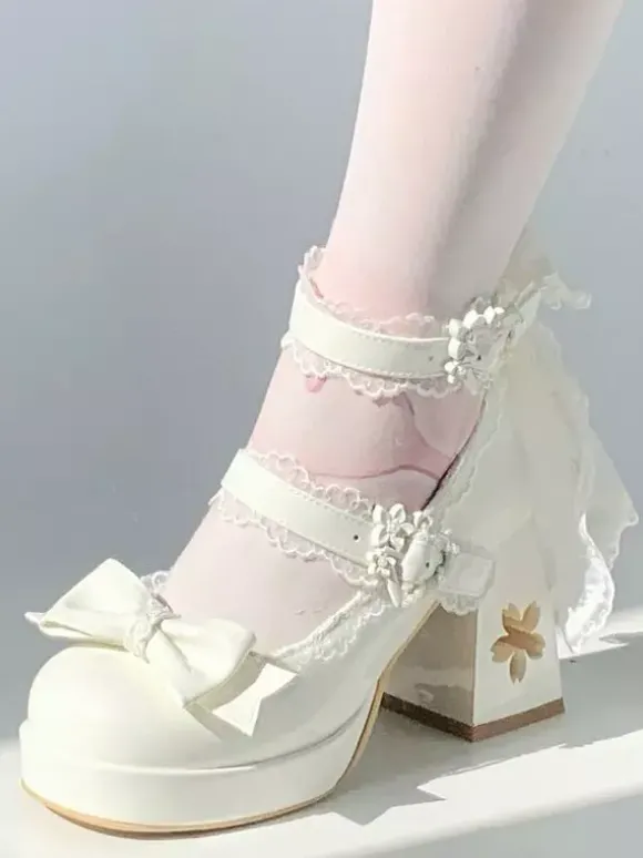 Escarpins Lolita Sweet blancs à lacets et n艙uds à l'arrière en cuir PU à talon compensé.
