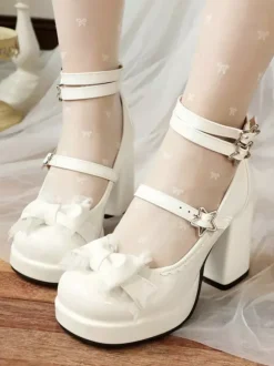 Escarpins Lolita Sweet 艙illets bleus n艙uds lacets bout rond cuir PU talon compensé.