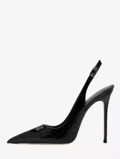 Escarpins noirs à talons hauts et bout pointu ornés de pierres bride arrière.