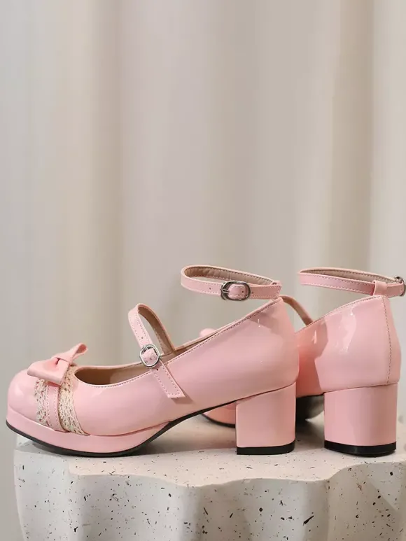 Escarpins Lolita à talons compensés en cuir verni ornés de n艙uds violets et de dentelle