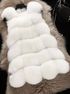 Gilet en fausse fourrure veste mi-longue d'hiver écologique sans manches pour femme 2026