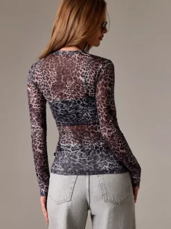 Haut à manches longues en maille imprimée léopard coupe ajustée col rond pour femme 2026