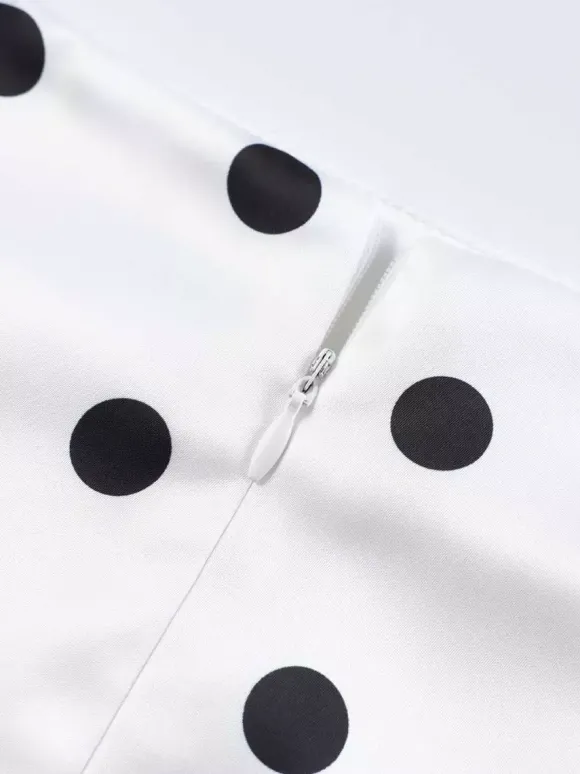 Jupe crayon élégante pour soirée formelle taille haute et coupe ajustée en satin à pois.
