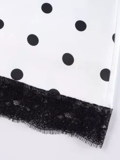 Jupe crayon élégante pour soirée formelle taille haute et coupe ajustée en satin à pois.