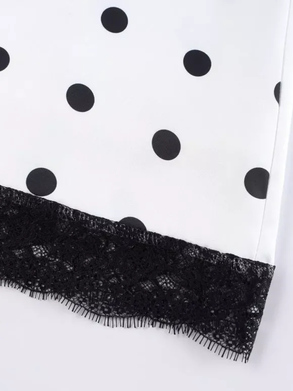 Jupe crayon élégante pour soirée formelle taille haute et coupe ajustée en satin à pois.