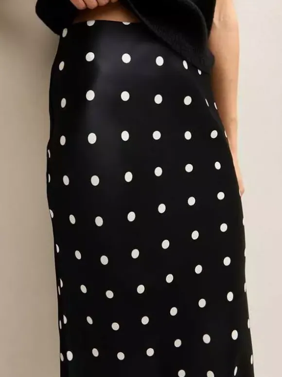 Jupe crayon élégante pour soirée formelle taille haute et coupe ajustée en satin à pois.