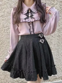 Jupe gothique lolita jupes lolita à volants et 艙illets noirs