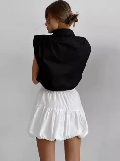 Jupe mini à volants et taille élastique effet ballons.