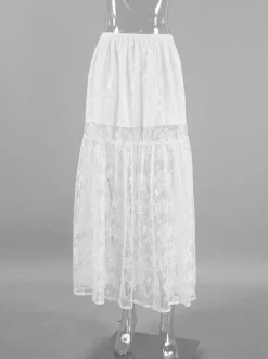 Jupe longue à volants en dentelle florale transparente à taille élastique noire et blanche transparente.