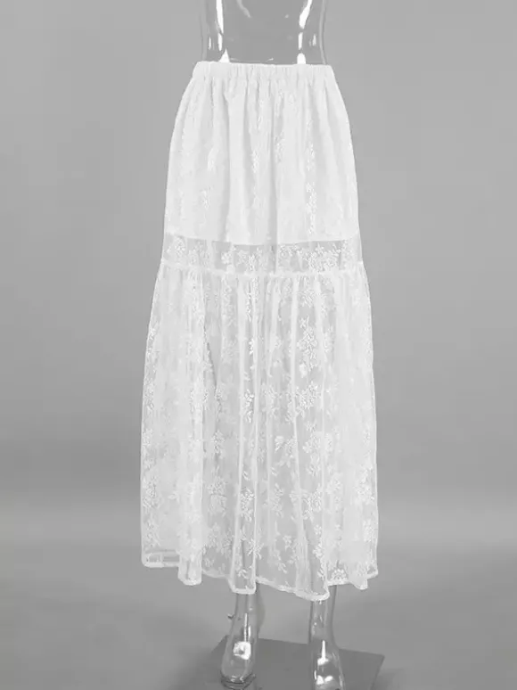Jupe longue à volants en dentelle florale transparente à taille élastique noire et blanche transparente.