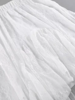Jupes blanches en dentelle élégantes coupe asymétrique longueur genou bas pour femmes