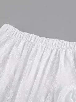 Jupes blanches en dentelle élégantes coupe asymétrique longueur genou bas pour femmes