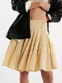 Jupes blanches plissées taille naturelle chic pour femmes