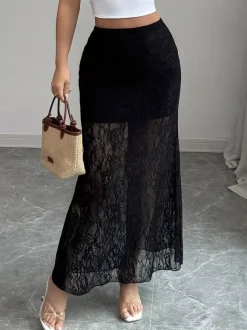 Jupes longues élégantes en dentelle noire à taille haute et transparente pour femmes