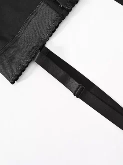 Lingerie gainante noire avec boutons sur le devant ceinture ventrale bretelles à boucle pantalon gainant avec fesses exposées combinaison avec bretelles amovibles