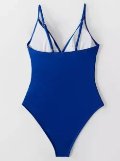 Maillot de bain une pièce femme à col en V froncé et bretelles spaghetti effet ventre plat.
