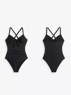 Maillot de bain une pièce à col en V et empiècements en dentelle pour l'été 2026