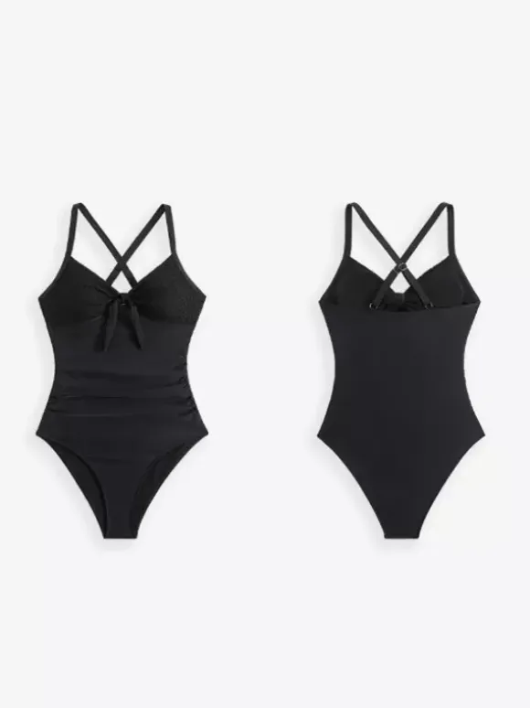 Maillot de bain une pièce à col en V et empiècements en dentelle pour l'été 2026