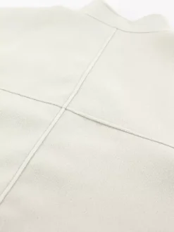 Manteau court femme à col montant - Veste crème coupe oversize - Tenues décontractées et minimalistes pour le printemps 2026