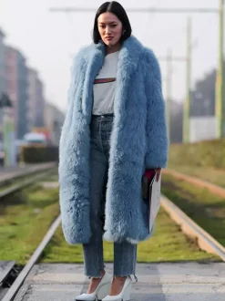 Manteau en fausse fourrure avec revers crantés couleur unie veste longue d'hiver écologique pour femme 2026