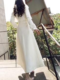 Manteau en laine évasé sur toute la longueur avec col en fausse fourrure blanche revers classique ceinture slim ligne A manteau d'hiver maxi 2026