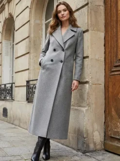 Manteau long croisé en laine coupe droite sophistiquée collection femme 2026