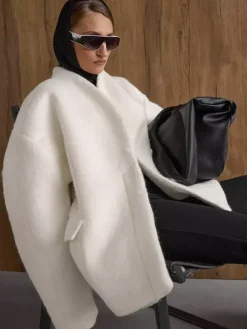 Manteau péplum en laine mélangée pour femme col montant manches chauve-souris et taille cintrée