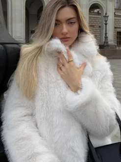 Manteau en fausse fourrure à revers crantés blanc Veste d'hiver écologique pour femme 2026
