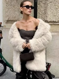 Manteau mi-long en fausse fourrure blanche à revers crantés Veste longue d'hiver écologique pour femme 2026