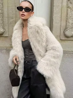 Manteau mi-long en fausse fourrure blanche à revers crantés Veste longue d'hiver écologique pour femme 2026