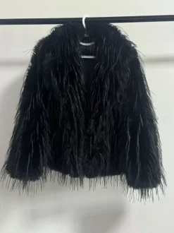 Manteaux en fausse fourrure à franges revers crantés veste d'hiver écologique pour femmes 2026