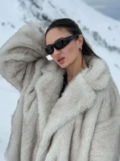 Manteaux en fausse fourrure Veste d'hiver blanche surdimensionnée à revers crantés pour femmes 2026