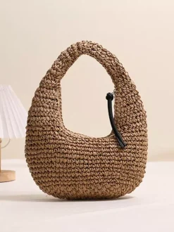 Mini sac bandoulière en raphia et paille style croissant tissé ajouré sac hobo sac à main d'été pour la plage.