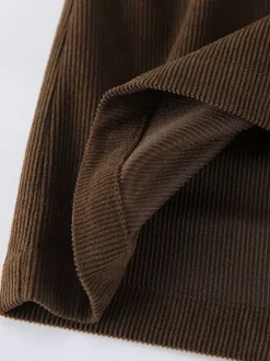 Mini-jupe femme en velours côtelé marron - Coupe rétro taille haute slim trapèze - Collection printemps-été 2026