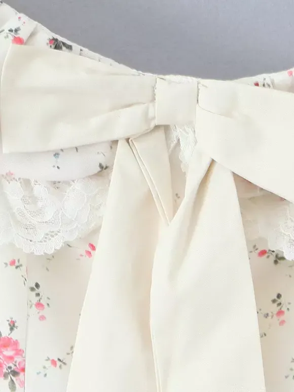 Mini-robe fleurie à épaules dénudées et n艙ud pour l'été 2026