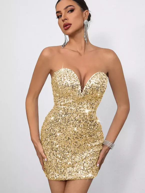 Mini-robe moulante à sequins décolleté en c艙ur et n艙ud dans le dos idéale pour les fêtes 2026