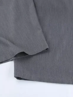 Pantalon de costume gris à taille haute plissé et jambes larges