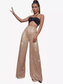 Pantalon palazzo à sequins taille haute et jambes larges style clubwear.