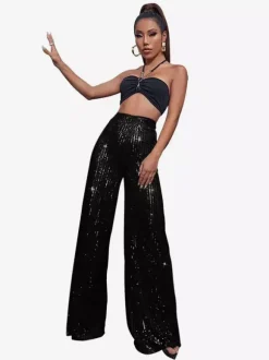 Pantalon palazzo à sequins taille haute et jambes larges style clubwear.
