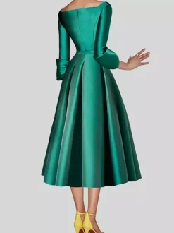 Petite robe noire jolie col en V manches 3/4 n艙uds tissu satiné ligne trapèze