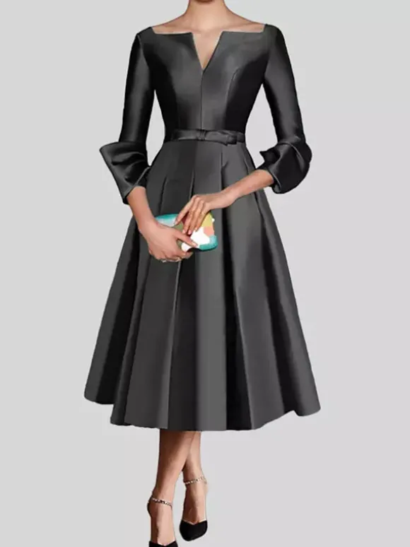 Petite robe noire jolie col en V manches 3/4 n艙uds tissu satiné ligne trapèze