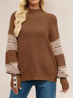 Pull en maille à col montant et rayures manches boutonnées collection femme 2026