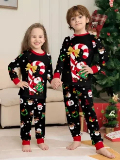 Pyjamas de Noël noirs et rouges pour toute la famille imprimé canne de Noël et Père Noël collection 2026