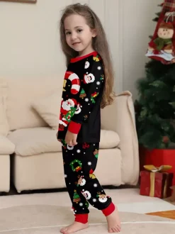 Pyjamas de Noël noirs et rouges pour toute la famille imprimé canne de Noël et Père Noël collection 2026