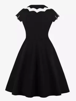 Robe cocktail vintage sans manches style swing années 1950