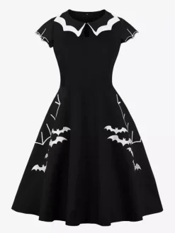 Robe cocktail vintage sans manches style swing années 1950