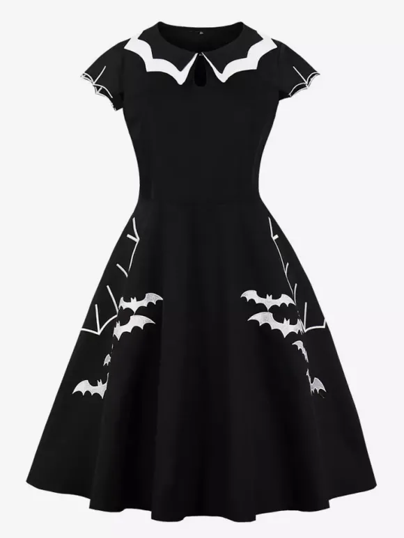 Robe cocktail vintage sans manches style swing années 1950