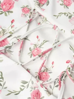 Robe courte à imprimé floral manches bouffantes col Claudine et lacets dans le dos été 2026
