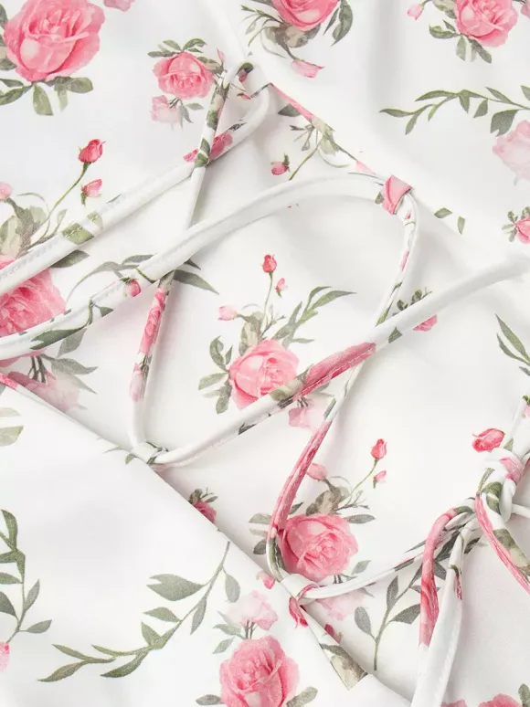 Robe courte à imprimé floral manches bouffantes col Claudine et lacets dans le dos été 2026