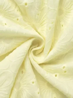Robe courte jaune à 艙illets col en V et manches bouffantes été 2026